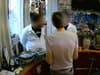 Fake gold fraudsters caught on CCTV: Con artists escape with cash after scamming pawnbroker