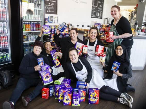 Jeanette Walsh, left and the Good Loaf team among some 500 eggs that you donated to our Easter appeal.